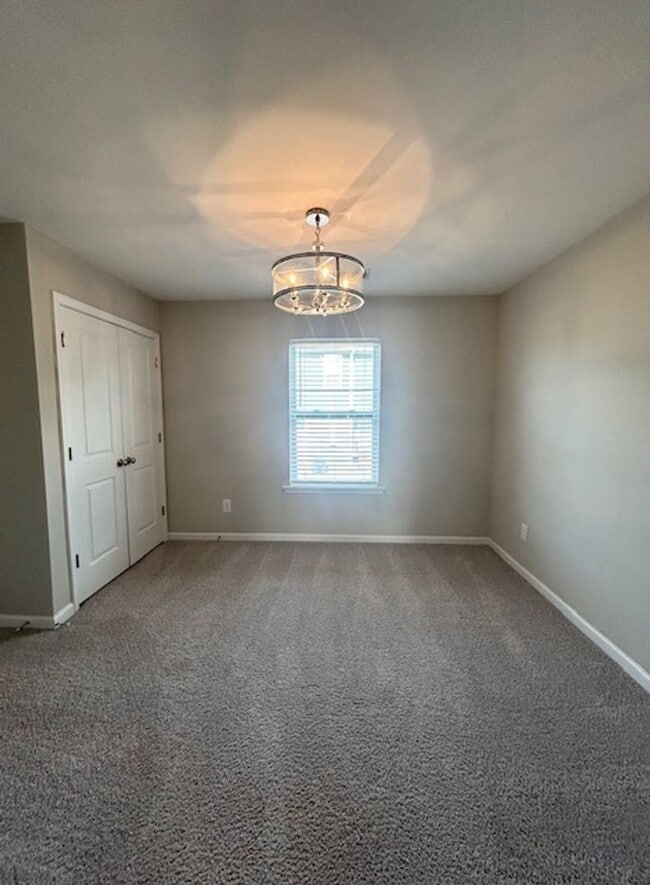 Building Photo - STYLISH & MODERN TOWNHOME IN HARBISON GROVE