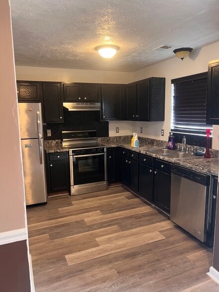 Building Photo - 5599 Windfall Ln