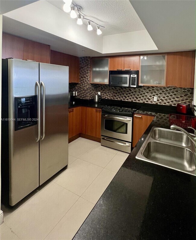 Building Photo - 16699 Collins Ave