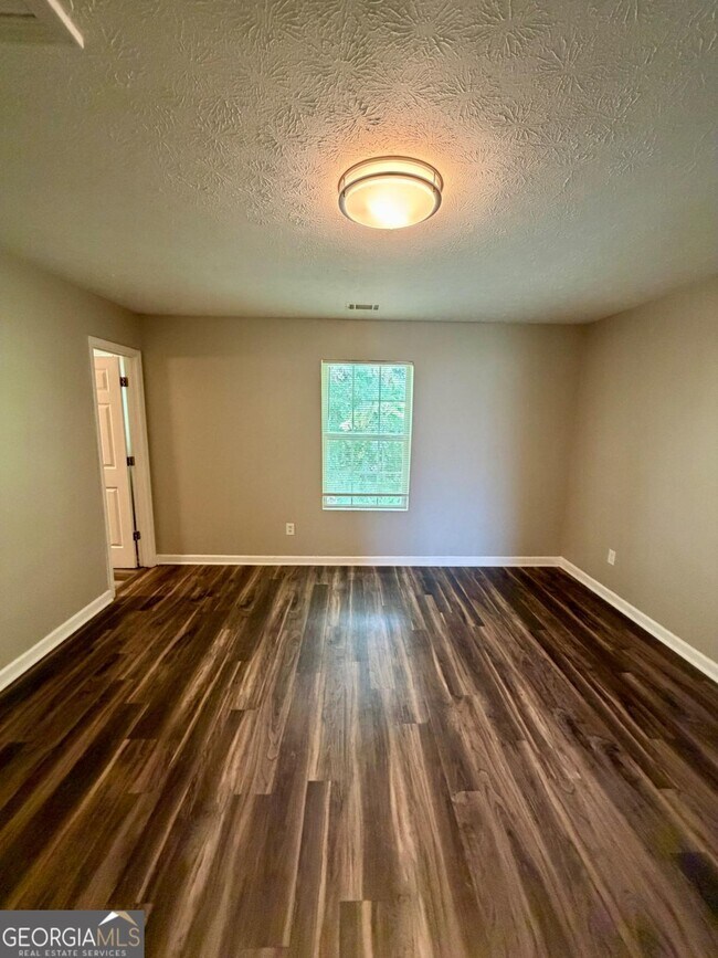 Building Photo - 5696 Windfall Ln