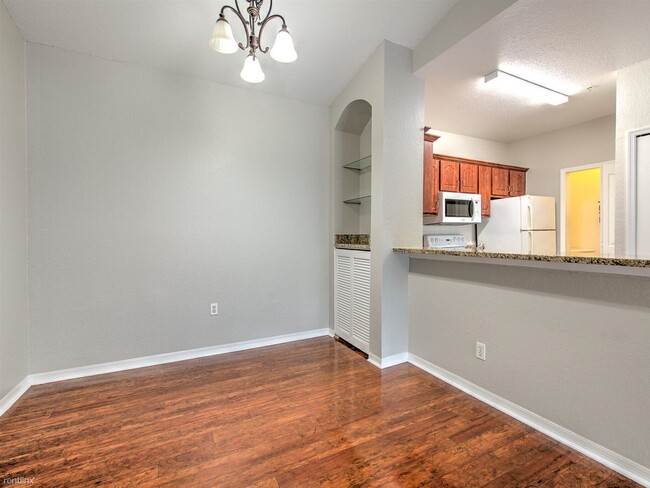 Building Photo - 2 br, 1 bath Condo - 5703 Legacy Crescent ...