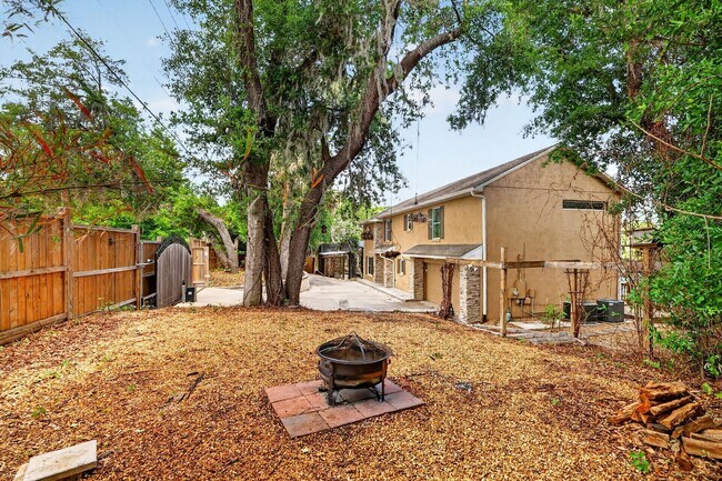 Building Photo - Available Now! Waterfront Living at Its Best – Pool, Decks & Gated Privacy