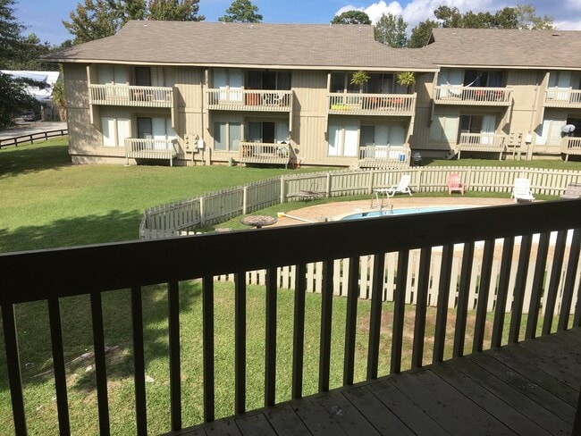 Building Photo - SOON AVAILABLE POOLSIDE CONDO!