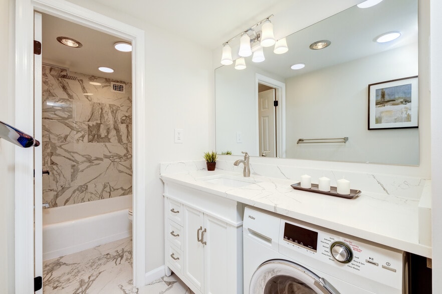 Fully remodeled bathroom with imported Italian calacata lazza quarts - 4401 Lee Hwy