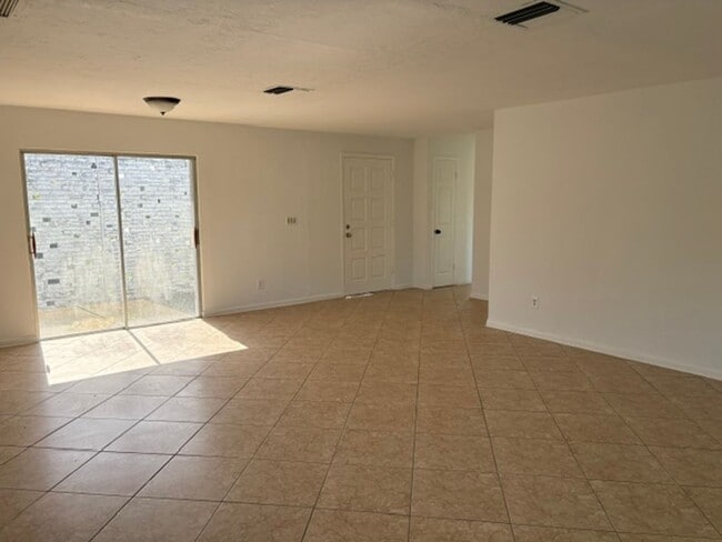 Building Photo - ****TWO WEEK FREE**** Charming 2-Bedroom Ranch in Cape Coral’s Bimini Basin Neighborhood