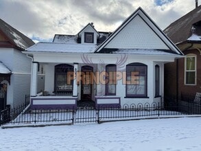 Building Photo - Charming Three-Bedroom Home with Garage and Yard