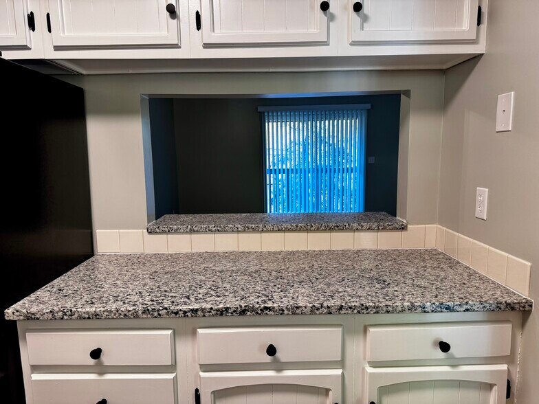 New granite counter tops, painted cabinets, new hinges & handles - 122 Turnwood Ln