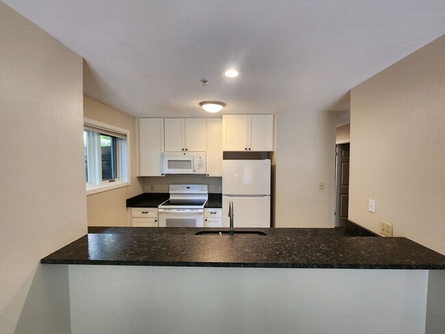 Building Photo - Updated 1BR Condo at the Edge of Boulder – Private Patio & Parking!