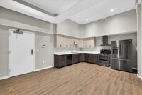 Building Photo - Live in Luxury! Stunning 1-Bedroom Apartment in Downtown Champaign