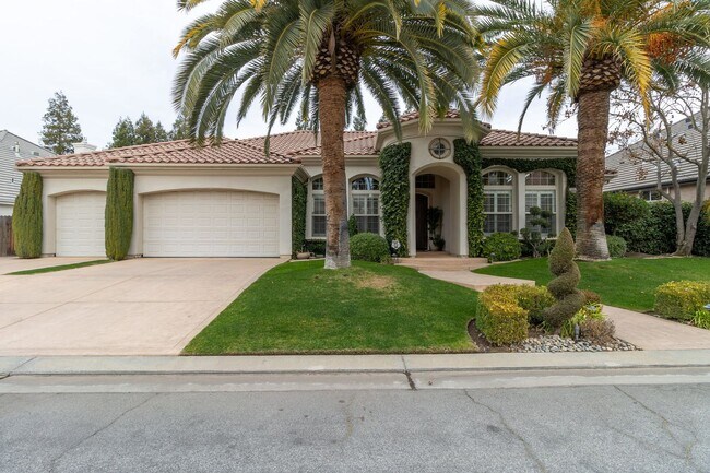 Building Photo - Luxurious Furnished Spanish-Style Home wit...
