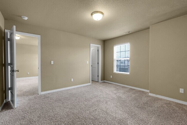 Building Photo - $2,490.95 - 4 Bed, 2.5 Bath Home in CO Springs with Fenced in Yard and 3 Car Garage!