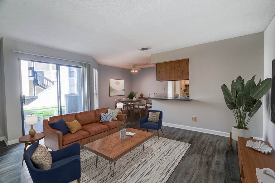 Living Room with Sliding Doors - Brookside Apartments