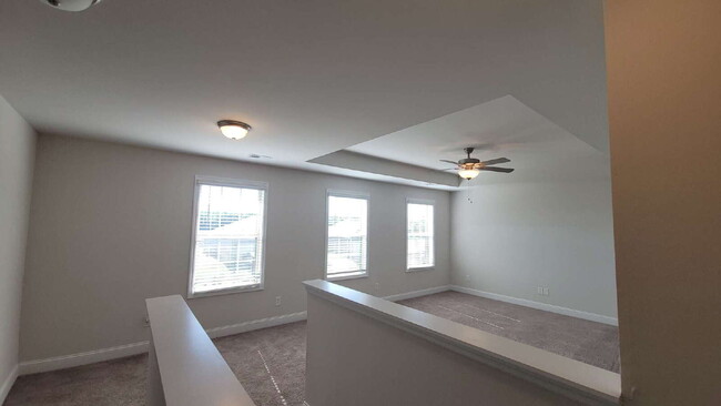 Building Photo - "Spacious 4-Bedroom Retreat with Modern Gr...