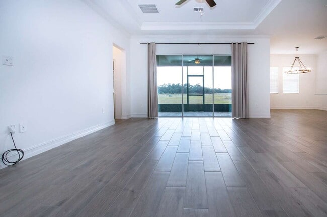 Building Photo - Spacious Like New 4-Bedroom Oasis with 3 F...