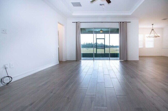 Building Photo - Spacious Like New 4-Bedroom Oasis with 3 Full Baths in Palmetto - Available NOW