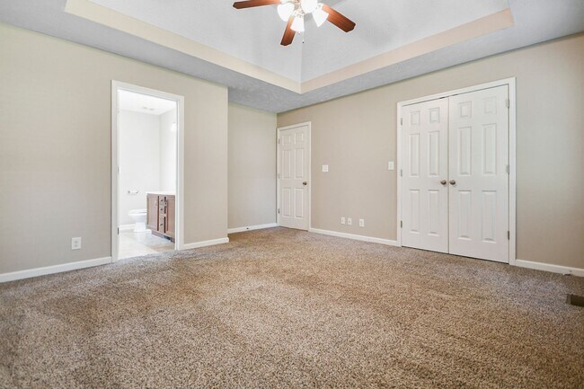 Building Photo - Pet Friendly Three Bedroom with Bonus!