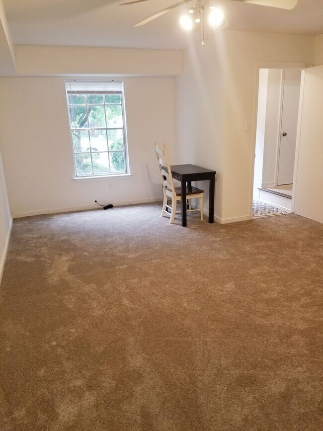 Building Photo - A spacious 3-Bedroom 1.5-Bathroom 3 Story Townhouse off of Old Forest Road With a Pool