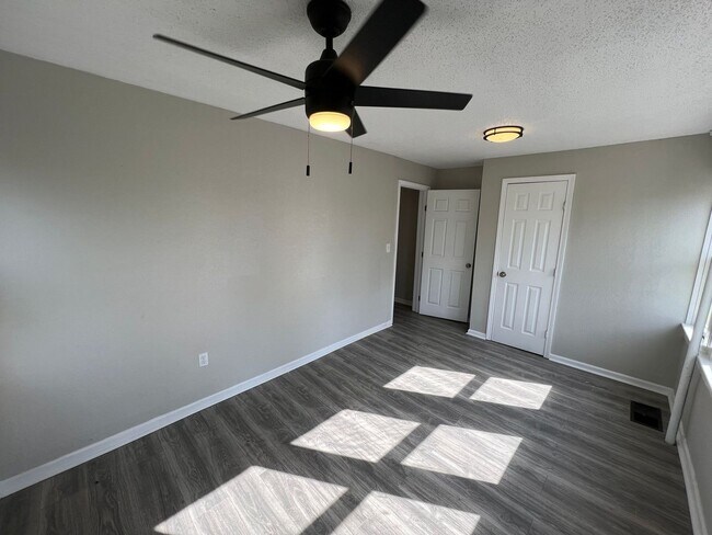 Building Photo - Updated 4-Bedroom Home with Plenty of Living and Storage Space.