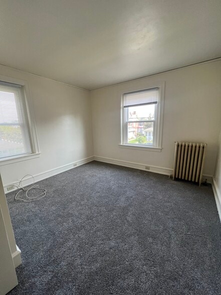 2nd floor front bedroom - 122 E 4th St