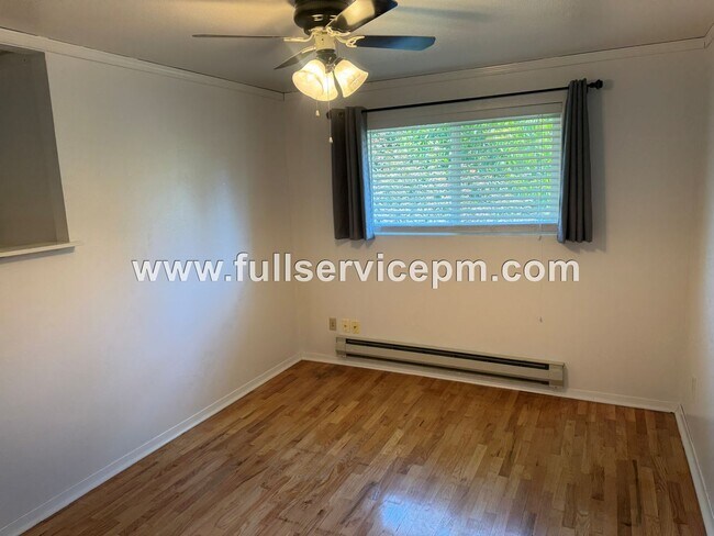 Building Photo - Spacious 4-Bedroom Upper-Level Home with Fireplace, Bonus Room & Large Deck
