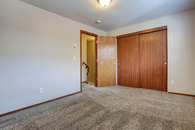 Bedroom 1 - Townhouse Village Apartments