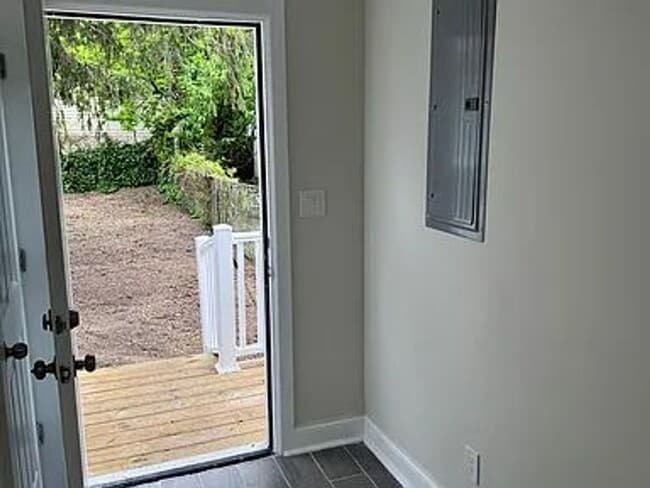 Building Photo - NEWLY REBUILT ONE LEVEL LIVING SPACE