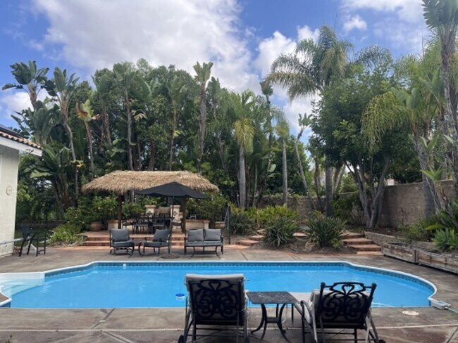 Building Photo - Stunning 4 bedroom Home with a Pool locate...