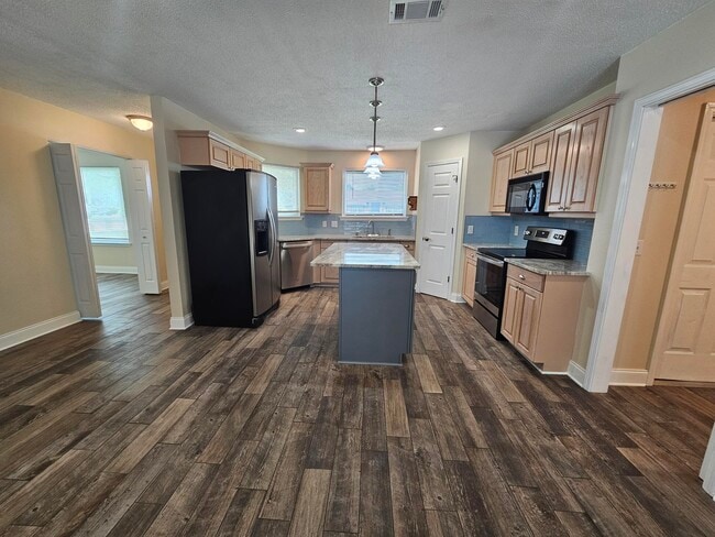 Building Photo - 8082 Sleepy Bay Blvd