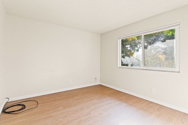 Building Photo - Utilities Included! Hayward 2-Bedroom with On-Site Laundry, Parking & Brand New Floors