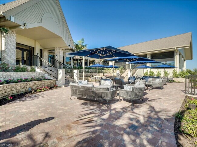 Building Photo - Turnkey 2-bedroom plus den villa, perfectly situated to capture stunning golf course and lake vie...