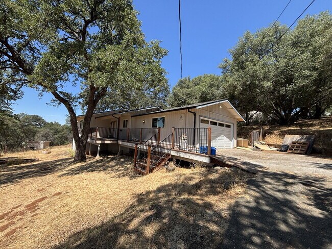 Building Photo - Fully remodeled home nestled on a spacious...