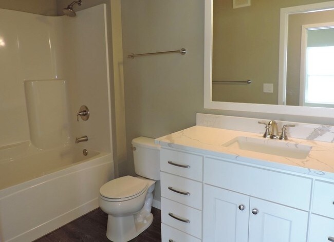 Building Photo - LUXURY CONDO - AVAILABLE NOW - MOVE IN PROMO