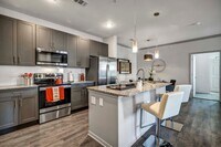 Building Photo - Spacious Comfort with Upscale Finishes!