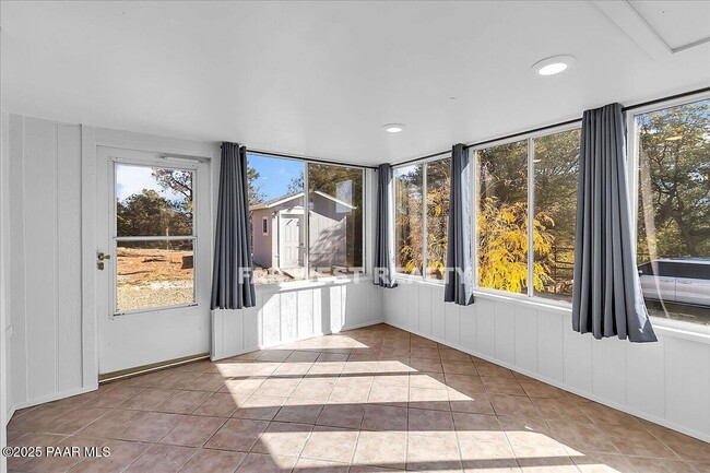 Building Photo - 2490 W Glenshandra Dr