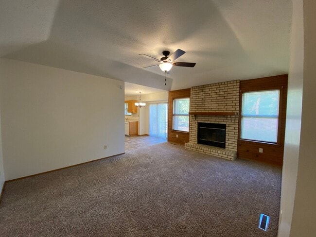 Building Photo - Three bedroom, two bathroom, two car garag...