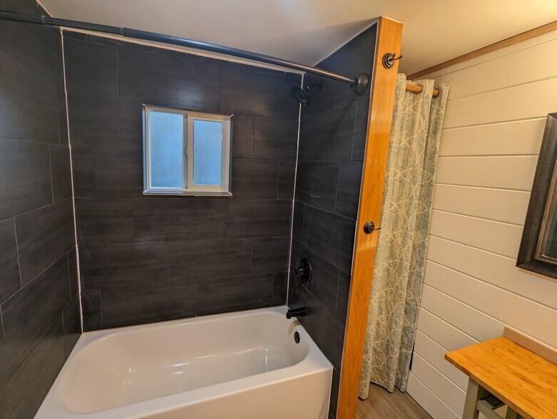 Shower and tub - 23603 W Lake Kayak Dr
