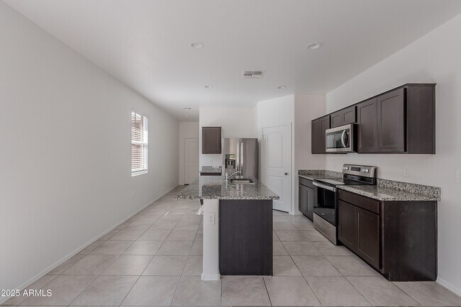 Building Photo - 35337 W San Alvarez Ave