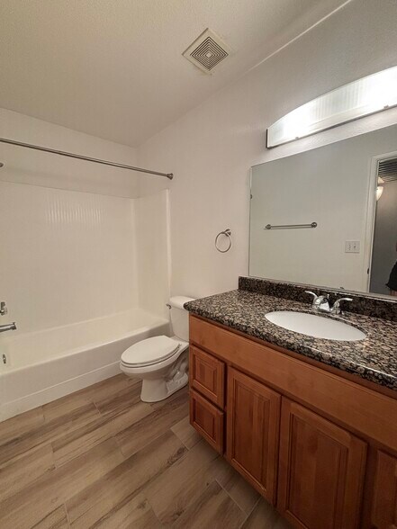 Full sized bathroom with coordinating countertops - 5877 N Granite Reef Rd