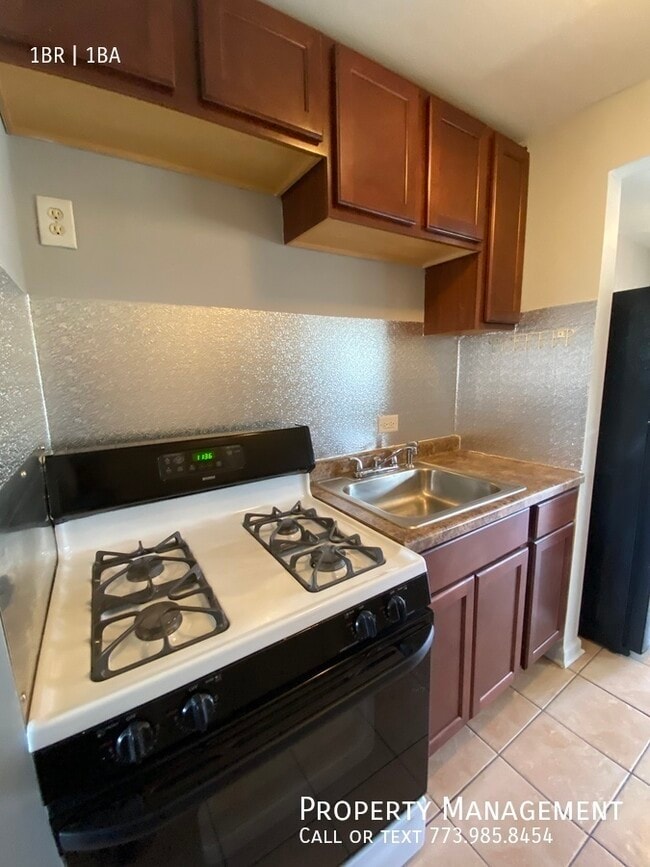 Building Photo - 8850 S Saginaw Ave