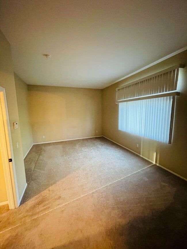 Building Photo - 42020 Dahlia Way