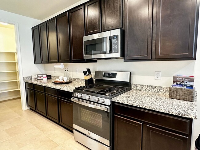 Building Photo - BEAUTIFUL VERRADO 3 BEDROOM PLUS DEN WITH ...