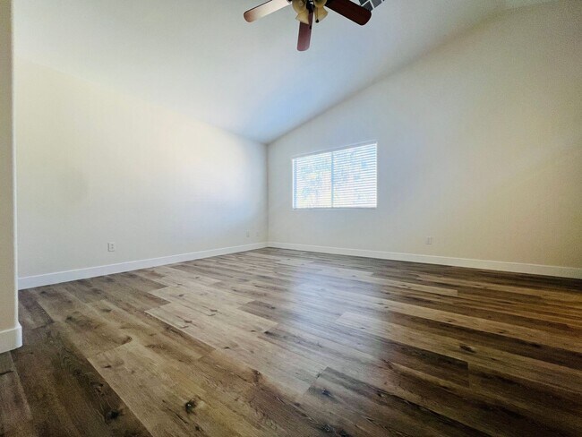 Building Photo - REMODELED, SPACIOUS, 4 BEDROOM HOME WITH VAULTED CEILINGS AND LOFT