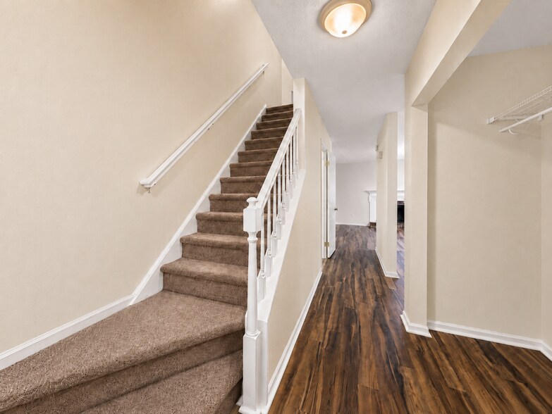 View upstairs from front door. - 5484 Pine Top Cir