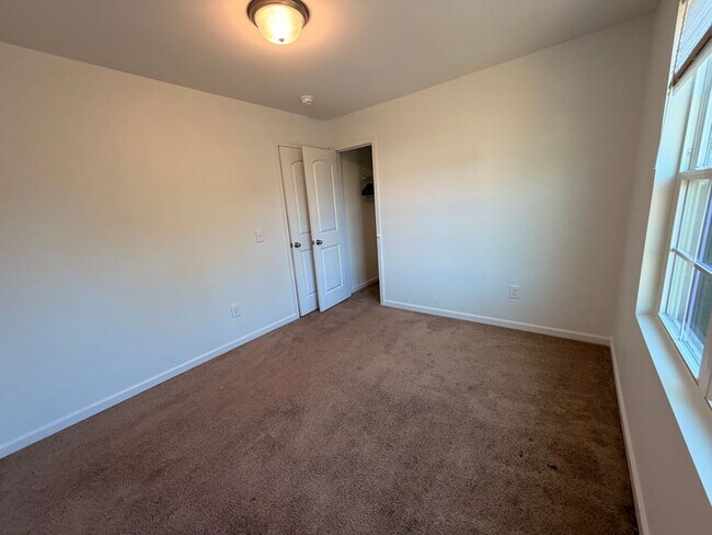 Building Photo - Available Now – Spacious 4BR Home on 1.5 Acres in Rural Hall!