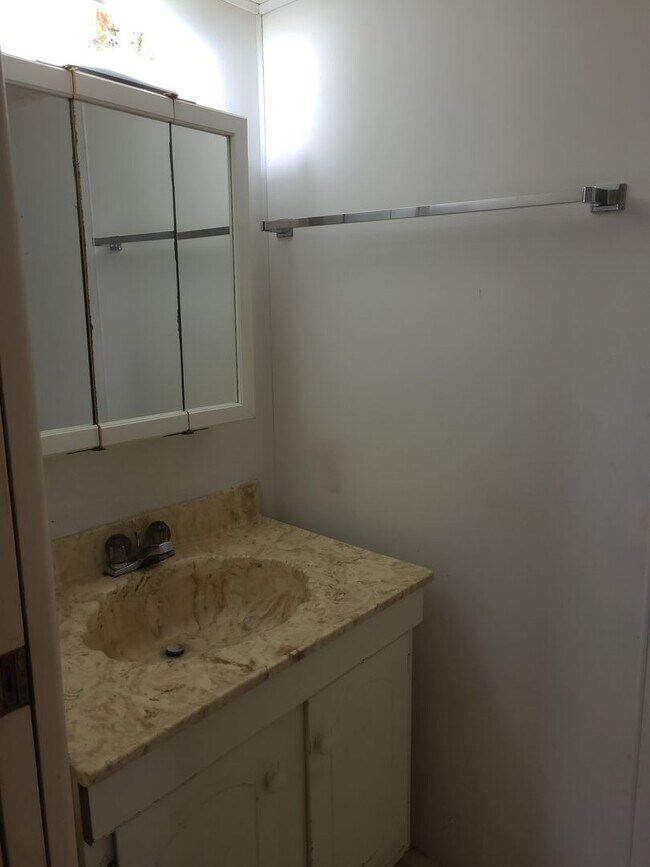 Building Photo - 55+ mobile home community. On canal to bea...