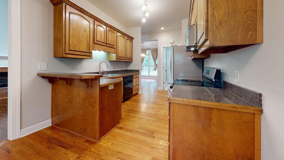 Building Photo - One Level 4 Bedroom Brick Home on N. Colle...