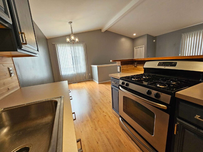 Building Photo - 2 Bedroom Condo with Vaulted Ceiling, Open Kitchen, Attached Garage in Desirable Clinton Township...