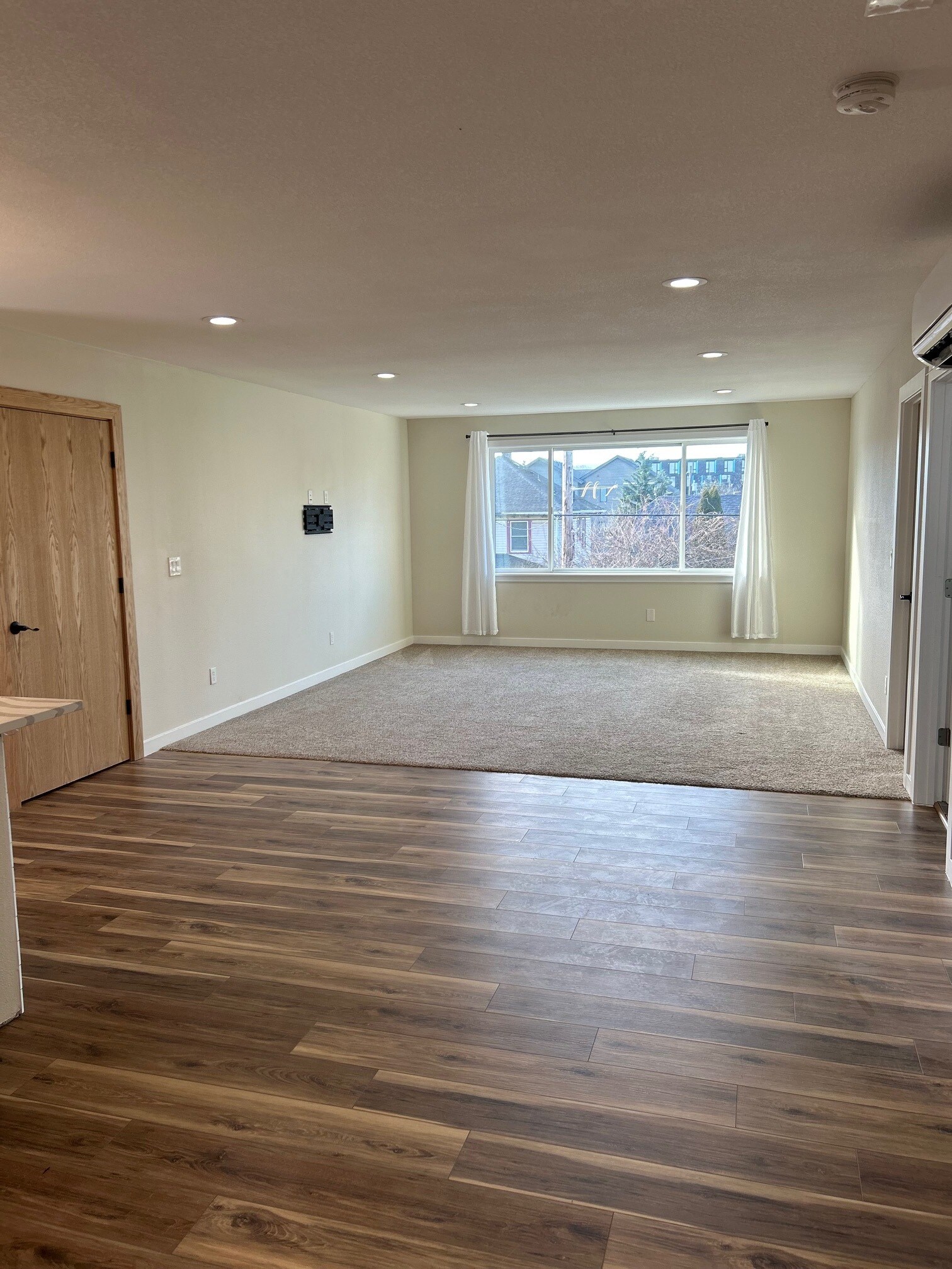 Living room with great views - 4022 NE Mallory Ave