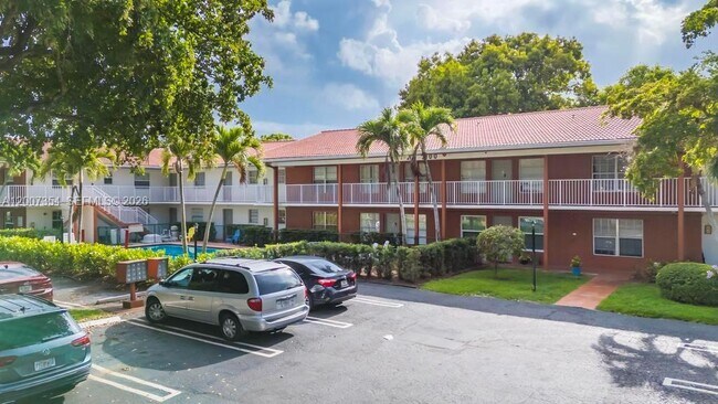 Building Photo - 3100 Coral Springs Dr