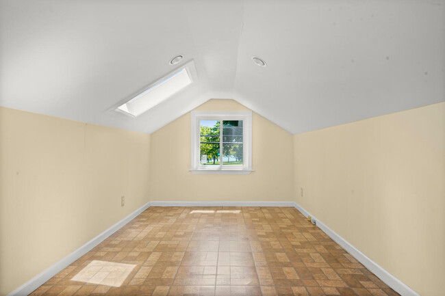 Finished attic with skylight. - 319 Davenport Ave